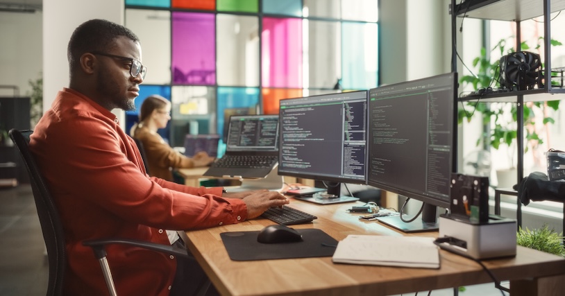 man working at computer