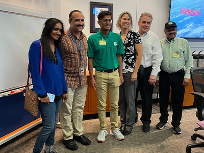 Dhruv and parents with Hughes team