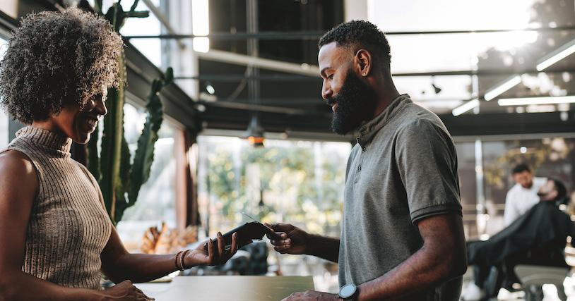 Customer using tap to pay