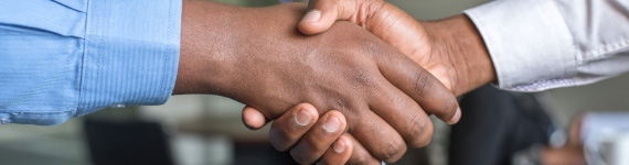 two people shaking hands