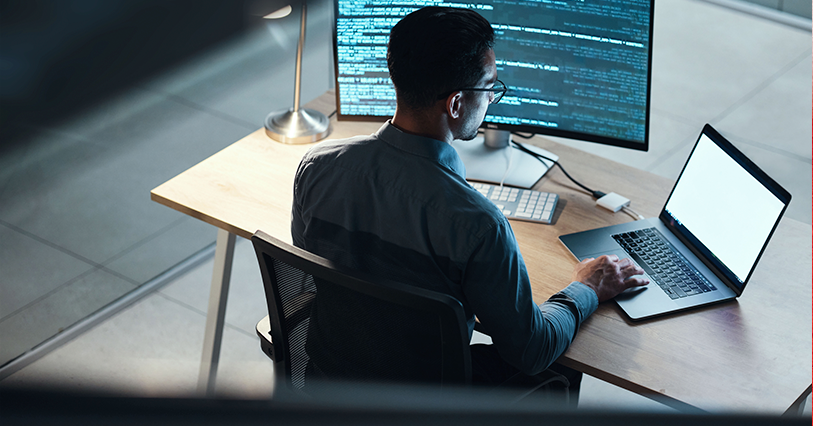 man working at computer