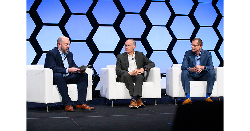 Jeffrey, Paul, and Glenn participating in a fireside chat during SATELLITE 2024