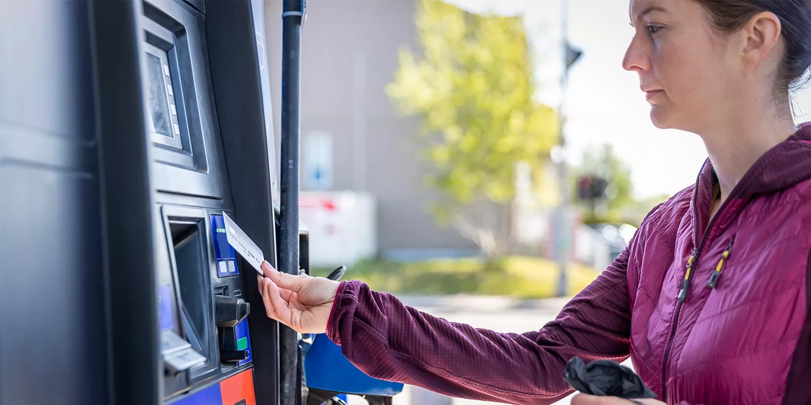 woman at gas pump