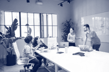 people working in conference room